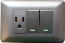 1 Tomacorriente + 2 Interruptores, 125V, Gris, Dx